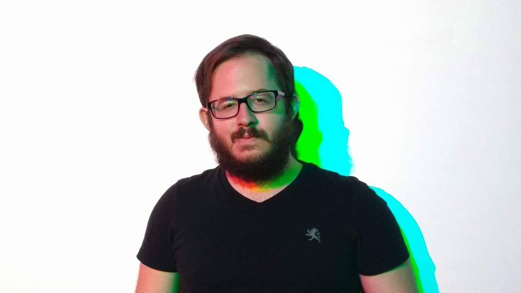 picture of luis pedreira-tome standing before a white wall
